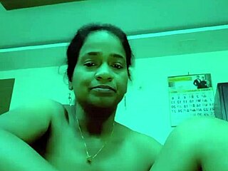 Old man engages in intimate activity with Saipriya.