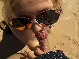 Voluptuous blonde indulges in 3D beach blowjob fetish