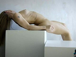 Blonde milf Nicole Aniston rips clothes in intense sensual striptease.