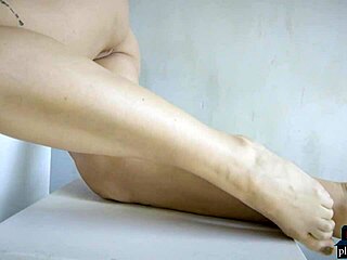 Blonde milf Nicole Aniston rips clothes in intense sensual striptease.