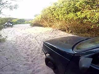 african woman seeks help on the beach
