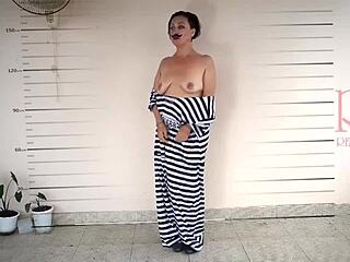 photographing detained lady undressing in prison for cosplay. camera captures every moment of her submission.