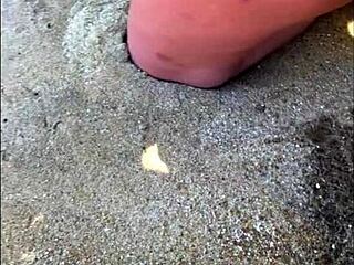 My wife peeing long on the beach in wild display