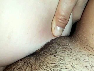 Intense lesbian tit-fucking leads to hairy pussy orgasm in POV view