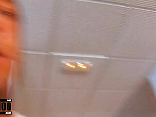 cute petite brunette with muscled man in intense session