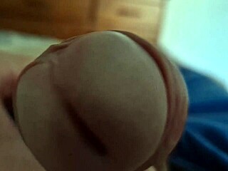 Solo performance of an exotic Brazilian man with close-ups of the head of his cock