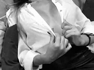 hot secretary waits for your blowjob instructions on big tits