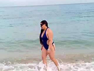 latina wife fucks guy on the beach