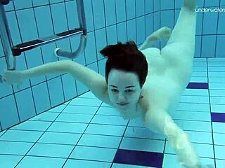 Lada Poleshuk flaunts big tits in underwater pool show