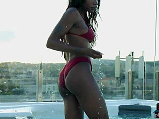 ebony beauty from cameroon mimi desuka gets naked in a pool for playboy
