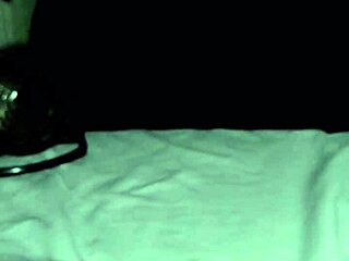 Asian milf masturbates while watching a movie