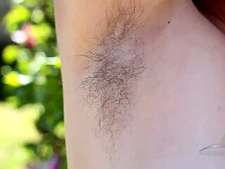 Betty shows off huge hairy tits outside
