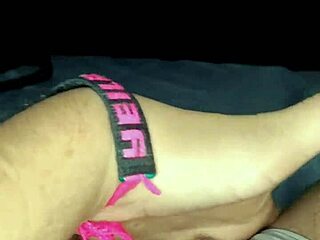 Asian milf masturbates while watching a movie