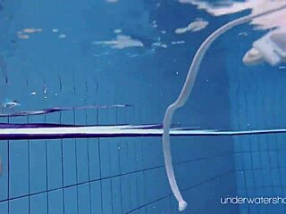 Roxalana Cheh Poses Underwater