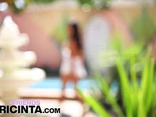 Putri Cinta is a beautiful girl who wears a wet t-shirt and shows her small perky breasts while swimming in the pool