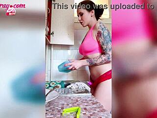 uh, this tattooed redhead’s dancin’ horny in bathroom n kitchen... hot comp!