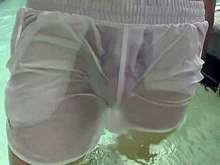 Hey, check out this pool boy with see-through underwater crossdressing fun