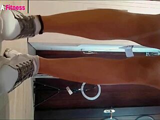 Tanned athletic brunette in jeans shorts shows her pussy without panties