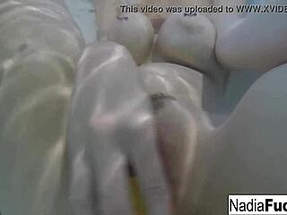 Sexy nadia takes a relaxing bath with rubber duckies