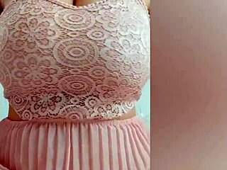 young cutie in pink dress playing with her big tits in front of the camera - depravedminx