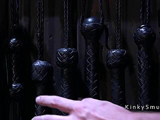 Bound babe endures rough anal with a dildo