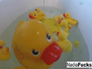 Sexy nadia takes a relaxing bath with rubber duckies