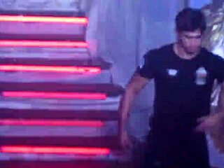 Handsome Brazilian stripper rips clothes in performance