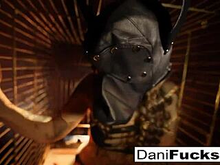 sexy dani daniels masturbates as a bitch in the cage