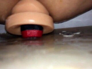 amateur plays with dildo toy alone