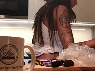 Look at this young wife flashing panties while doing dishes!