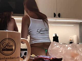 Look at this young wife flashing panties while doing dishes!