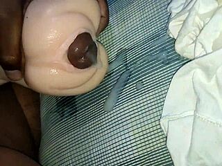 Putting Cock In Doll In Gay Sex Scene