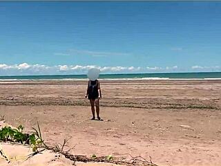 milf dares play nude football on clothed public beach