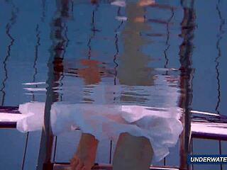 Beautiful Polish woman shows off her hairy body in the pool