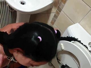 Emo bondage slut dragged to toilet for piss and sucking