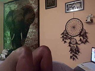 naej ae rubs her twat while watching lesbian porn