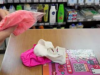 Asian Ladyboy Boldly Shows New Thong In Convenience Store With Stockings