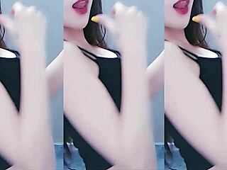 Pretty Chinese girl performs a sexy dance and shows her arousal