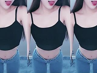 Pretty Chinese girl performs a sexy dance and shows her arousal