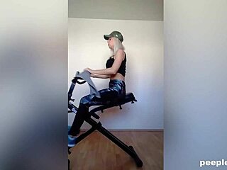Miss Sporty, a blonde amateur, masturbates during her workout session at home.