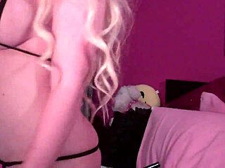 Blonde amateur in see-thru bikini shows big tits in extreme cam session