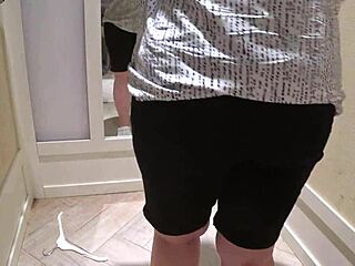 Hidden cam spies mature chubby milf trying shorts in fitting room