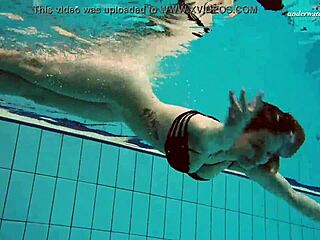 Dashka Stuns with Big Tits in Tight Pool Bikini