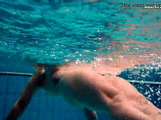 Dashka Stuns with Big Tits in Tight Pool Bikini