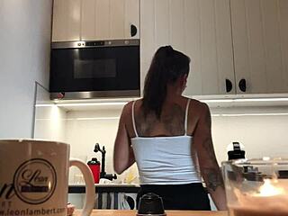 Softcore kitchen spy cam action with braless Sylvia