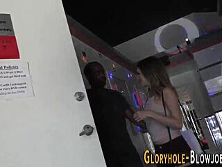 Blonde teenager sucks huge cock through wild gloryhole