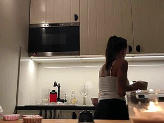 Softcore kitchen spy cam action with braless Sylvia