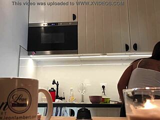 Softcore kitchen spy cam action with braless Sylvia