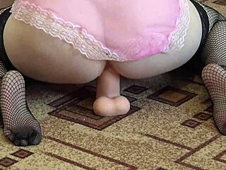 brunette in stockings fucks her juicy butt with big rubber dick