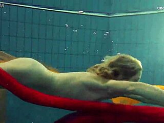 Petite teen Nastya's outdoor striptease in the pool